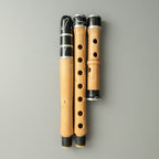 Exclusive Cornelian Cherry wood kaval in D, shown in three parts with black and white marbled joints and mouthpiece